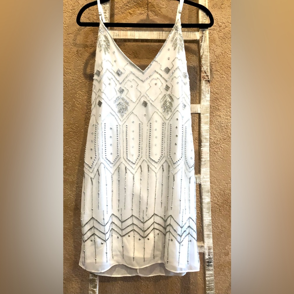 Silver Beaded white dress. In great condition.